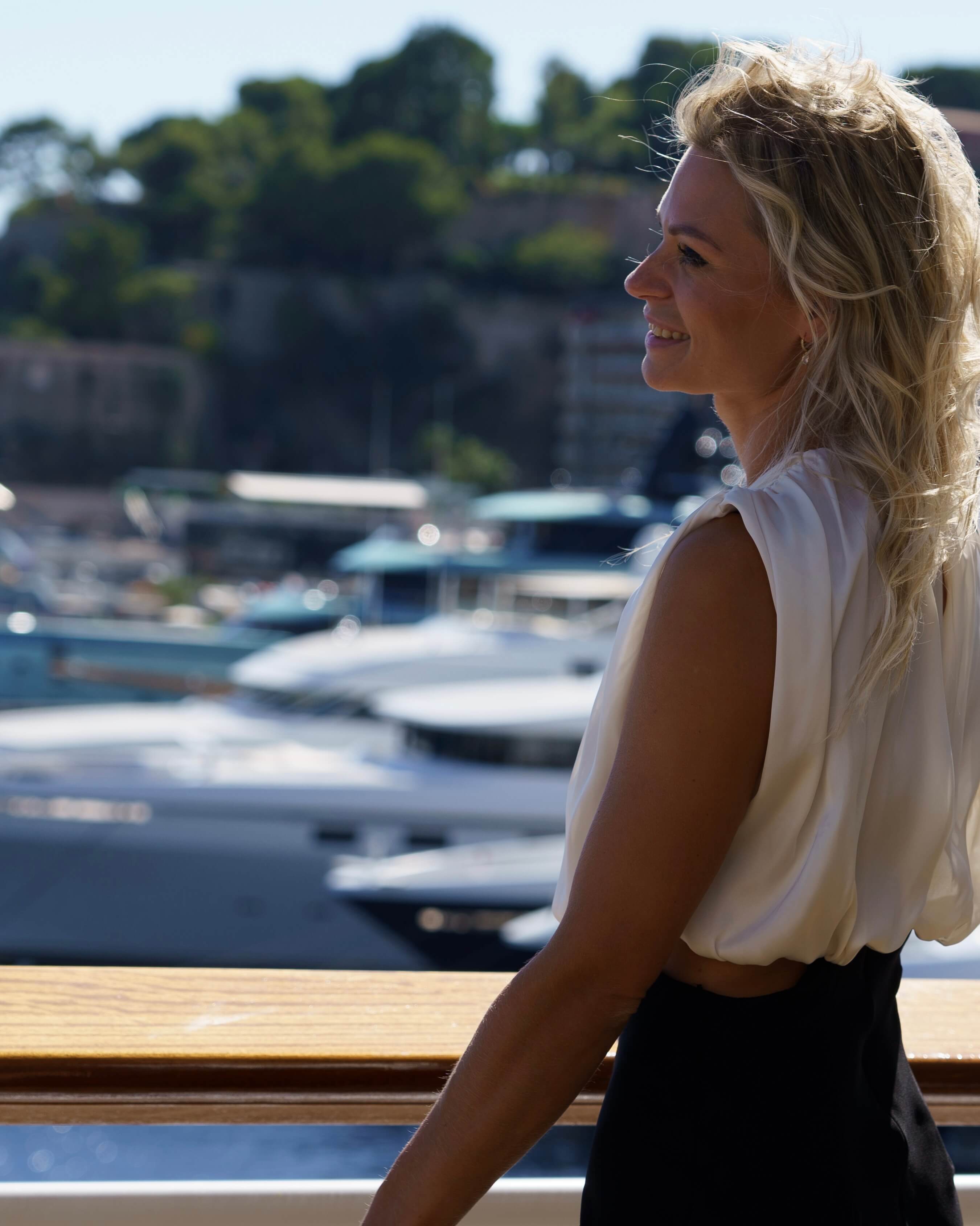 Signe Putna overlooking the yacht harbour in Monaco